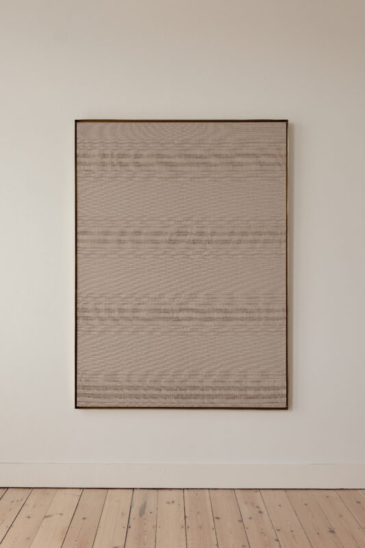 Framed artwork made of bio cotton on paper, featuring textured beige lines against a light background.