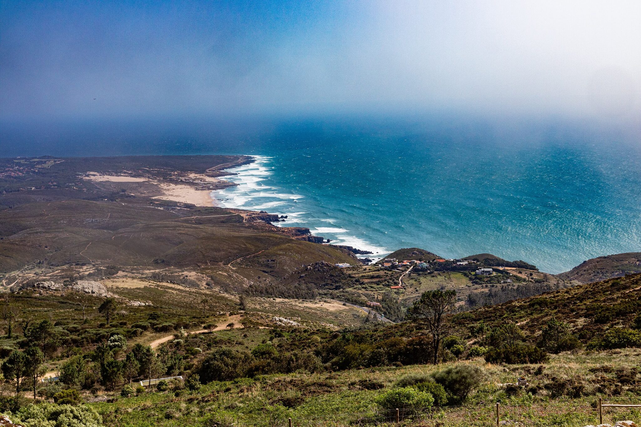 View of the North Atlantic Ocean and Sintra shores from the Sanctuary of Peninha in Sintra-Cascais Natural Park, Portugal.