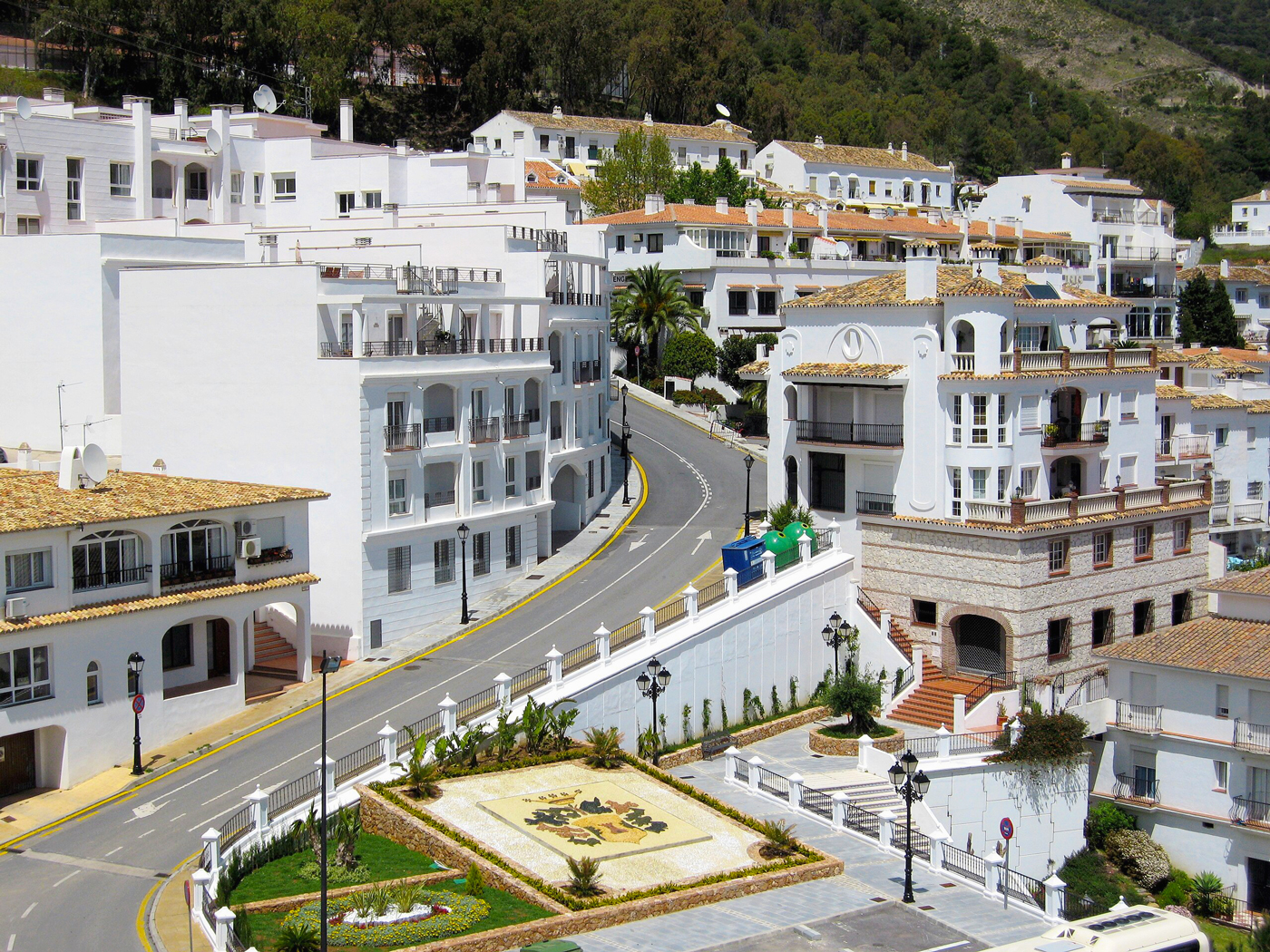 Winding streets and whitewashed homes on the hillside of Mijas, showcasing a picturesque Spanish village.