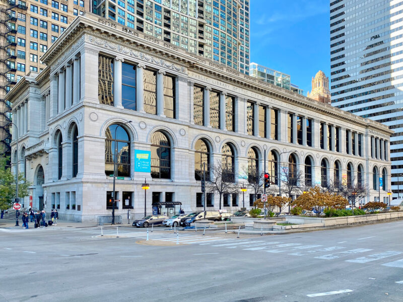 Historic Chicago Cultural Center, formerly the Chicago Public Library, features arched windows and a stone facade on Michi...