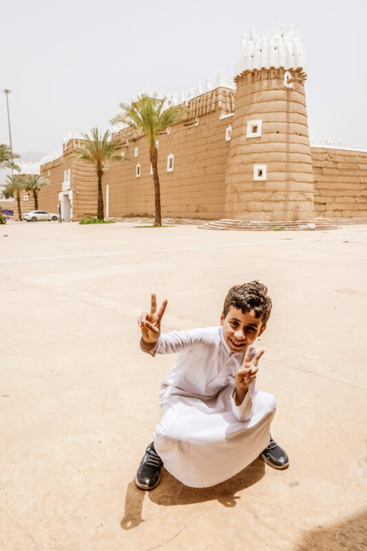 Young boy in front of Amarah Palace.