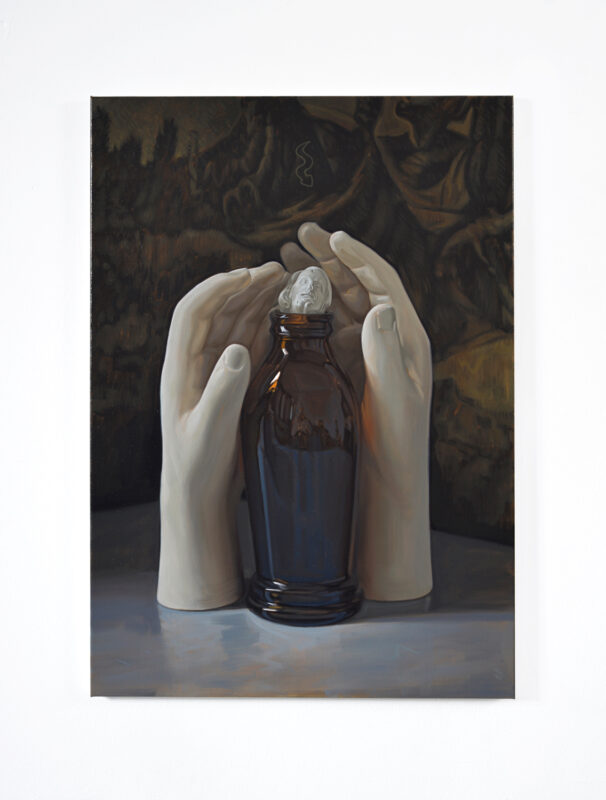 Two large, white hands cradle a dark glass bottle with a small white object on top, set against a dark, textured background.