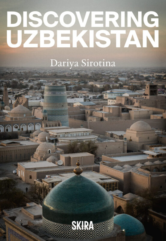 Aerial view of Tashkent's skyline featuring domes and minarets, with the title "Discovering Uzbekistan" prominently displa...