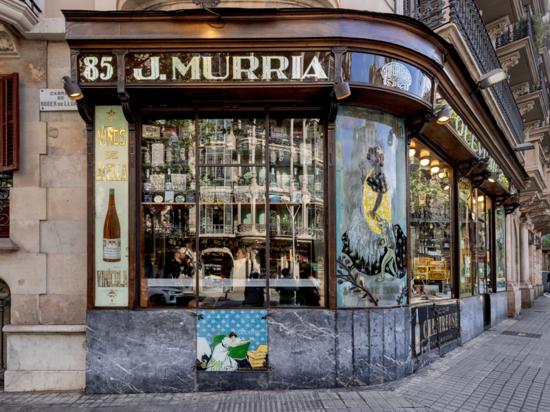 Historic storefront of J. Murria in Barcelona, featuring decorative glass windows and vintage signage.